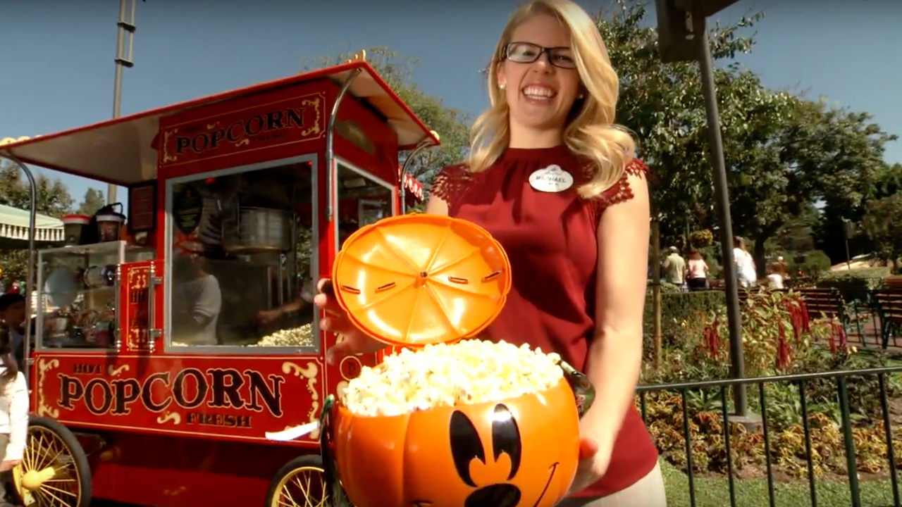 Disney Parks Food and Beverage Project Manager displaying popcorn bucket