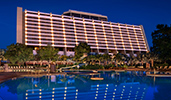 The exterior of Disney's Contemporary Resort and a large swimming pool
The exterior of Disney's Contemporary Resort and a large swimming pool