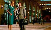 A Cast member speaking to a man in a suit inside Disneys Coronado Springs Resort A Cast member speaking to a man in a suit inside Disneys Coronado Springs Resort