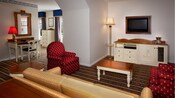 Sofa, cushioned chairs, 5 wood tables, lamps, drawers, mirror, ice bucket, water glasses and mounted TV