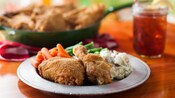 Fried chicken with mashed potatoes, carrots and green beans