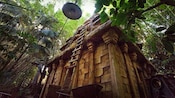 The Indiana Jones Adventure temple sits in a thick jungle in Disneyland Park