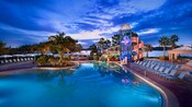 The Bay Lake Tower pool and waterslide at sunset