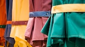 Row of brightly colored sun umbrellas outside Cape May Café in Disney's Beach Club Resort