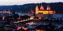 St. Stephen’s Cathedral in Passau, Germany is lit up at dusk