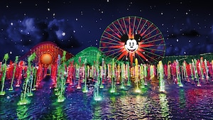 Paradise Pier and Mickey's Fun Wheel near fountains lit up with lights