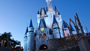Cinderella Castle rising into the evening sky above Magic Kingdom park at Walt Disney World Resort