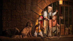 Audio-Animatronic pirates beg for canine assistance during Pirates of the Caribbean in Adventureland