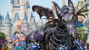 A steampunk-style parade float of Maleficent in dragon form at Disney Festival of Fantasy Parade