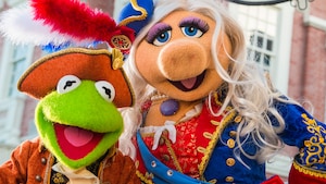 Kermit and Miss Piggy from The Muppets during a performance in Liberty Square at Magic Kingdom park