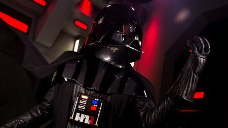 Darth Vader raises his fist menacingly during a ‘Star Wars’ experience at Disney’s Hollywood Studios