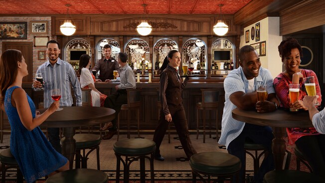 Guests enjoy beer and wine in a English style tavern with leather furniture and wood and brass accents