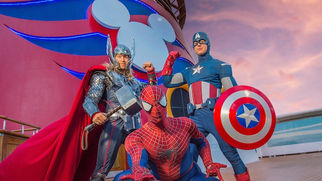 Marvel superheroes Thor, Captain America and Spiderman pose together on the deck of a Disney Cruise Line ship