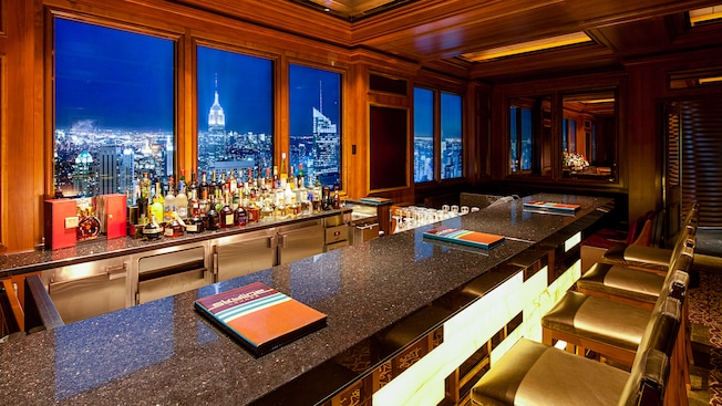 The panels behind a granite bar show a mural designed to create a convincing cityscape view