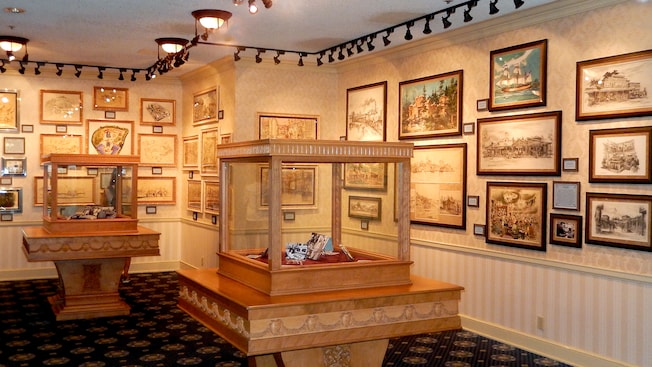 Artifacts and paintings are displayed in the Disney Gallery