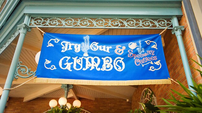 Try Our Specialty Coffees & Gumbo sign for Royal Street Veranda, a Disneyland restaurant.