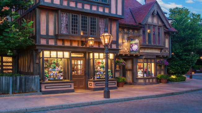 The exterior of The Queen's Table at the United Kingdom Pavilion evokes a quaint country village vibe