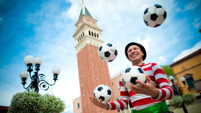 Master juggler and comedy mime Sergio juggles 4 soccer balls at the Italy Pavilion in Epcot
