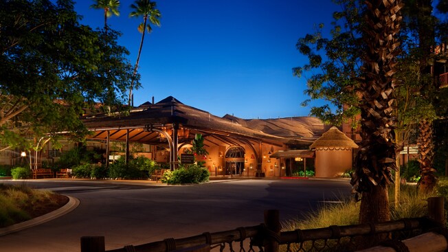 A nighttime exterior view of the main building of Disney’s Animal Kingdom Villas – Kidani Village