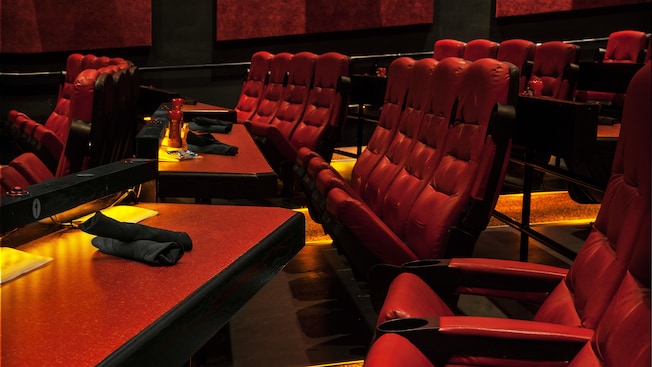 Close-up of dining table and theater seats