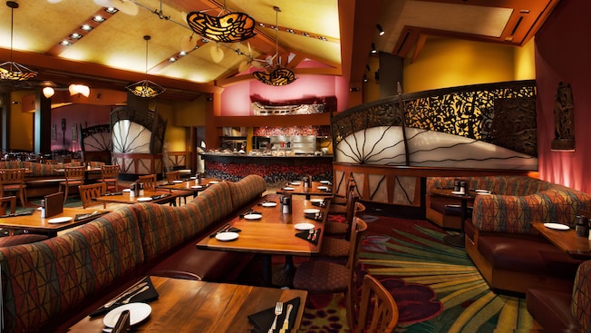 Banquette booths, tables and chairs in dining room at Kona Café