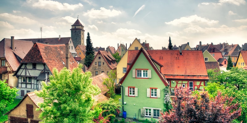 Tudor-style buildings and shops line the cobblestone streets of Rothenburg's medieval old town area