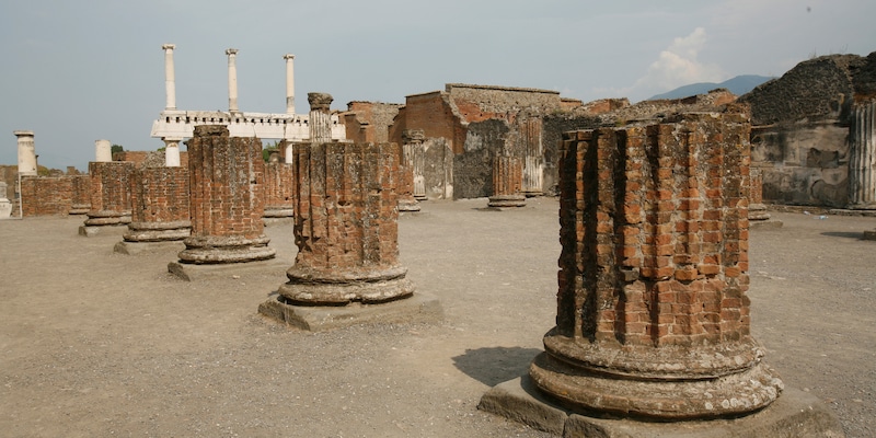 A row of large brick column bases are all that remain of a Pompeii building