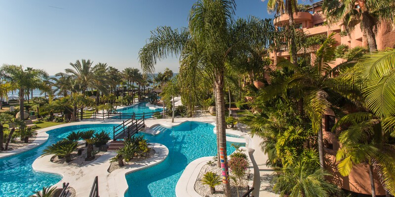 The Kempinski Hotel Bahía overlooks the pool area with its island feature and lush fauna