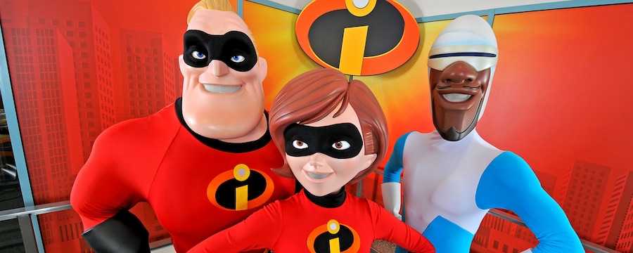 Mr. Incredible and Elastigirl next to Frozone